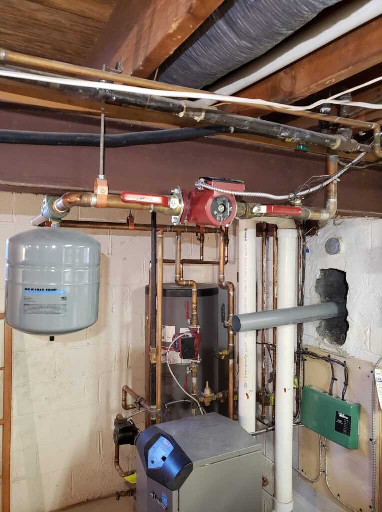 Water heater and boiler piping in a basement