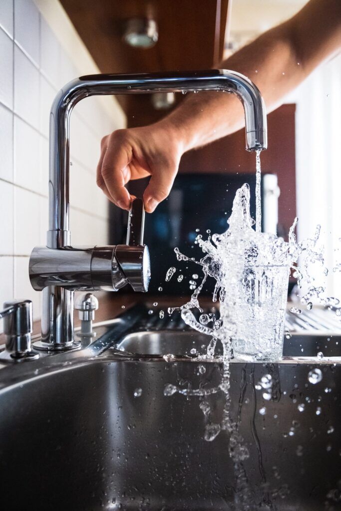 Water running from a kitchen faucet