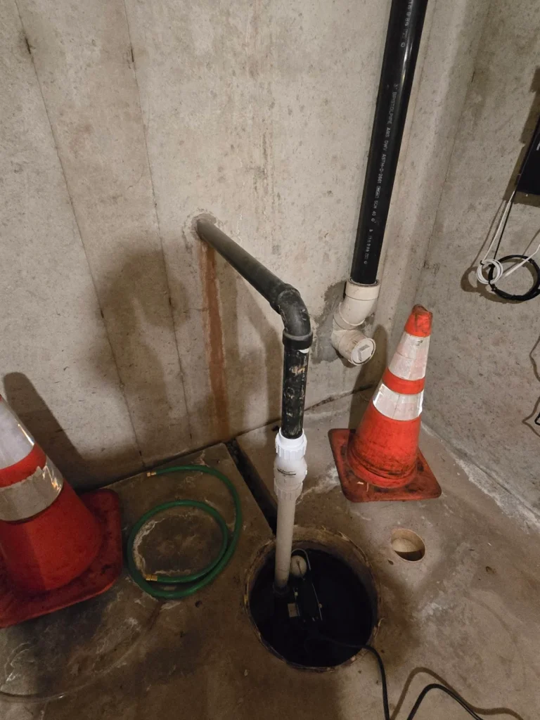 Basement sewer cleanout and drain pipe