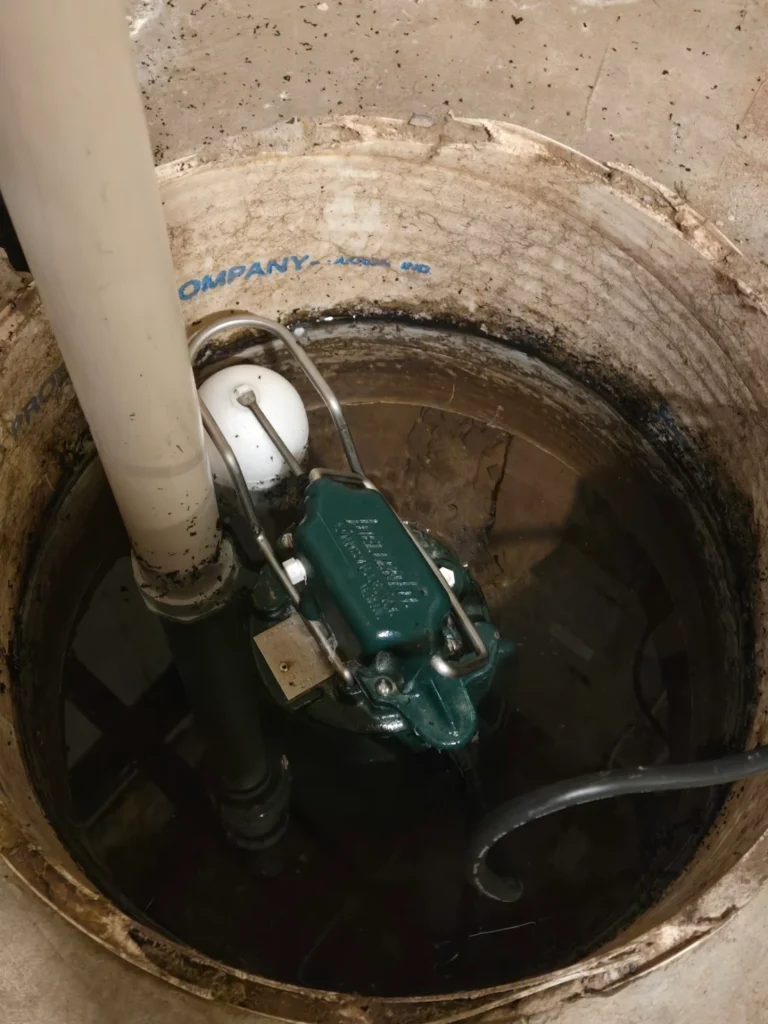 Sump pump in a basement sump pit